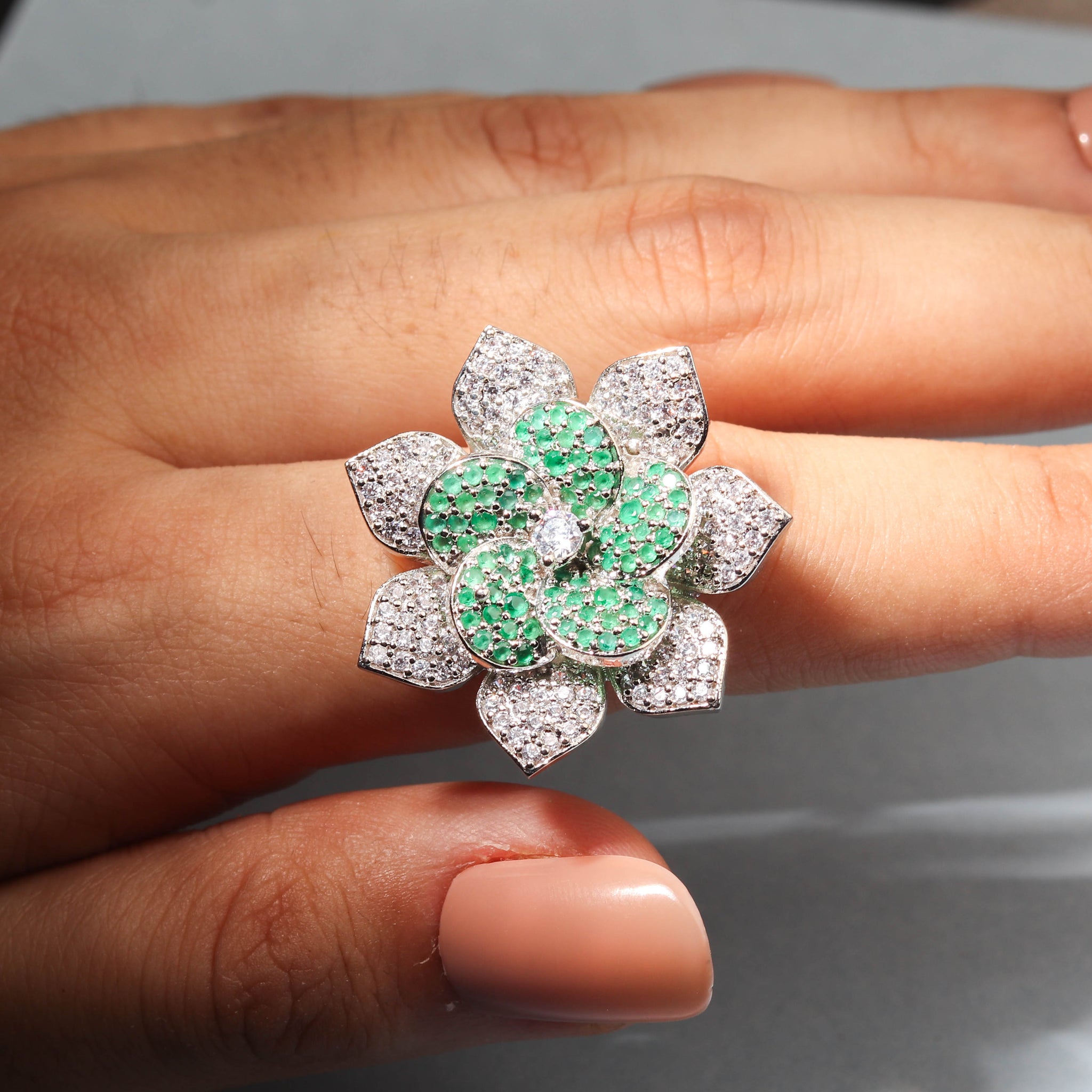 Elegant Flower Shaped Finger Ring With Green Stones For Women - Free Size