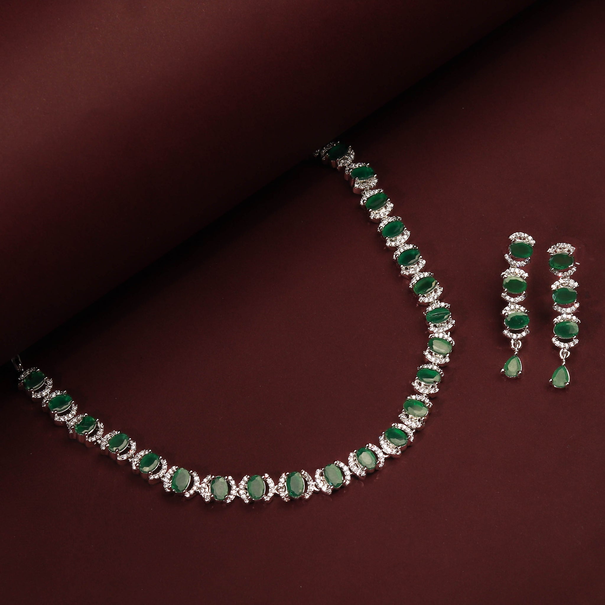 Rhodium Plated Beautiful Necklace Set With Green Stones And Pair Of Earrings