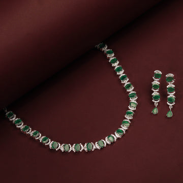 Rhodium Plated Beautiful Necklace Set With Green Stones And Pair Of Earrings