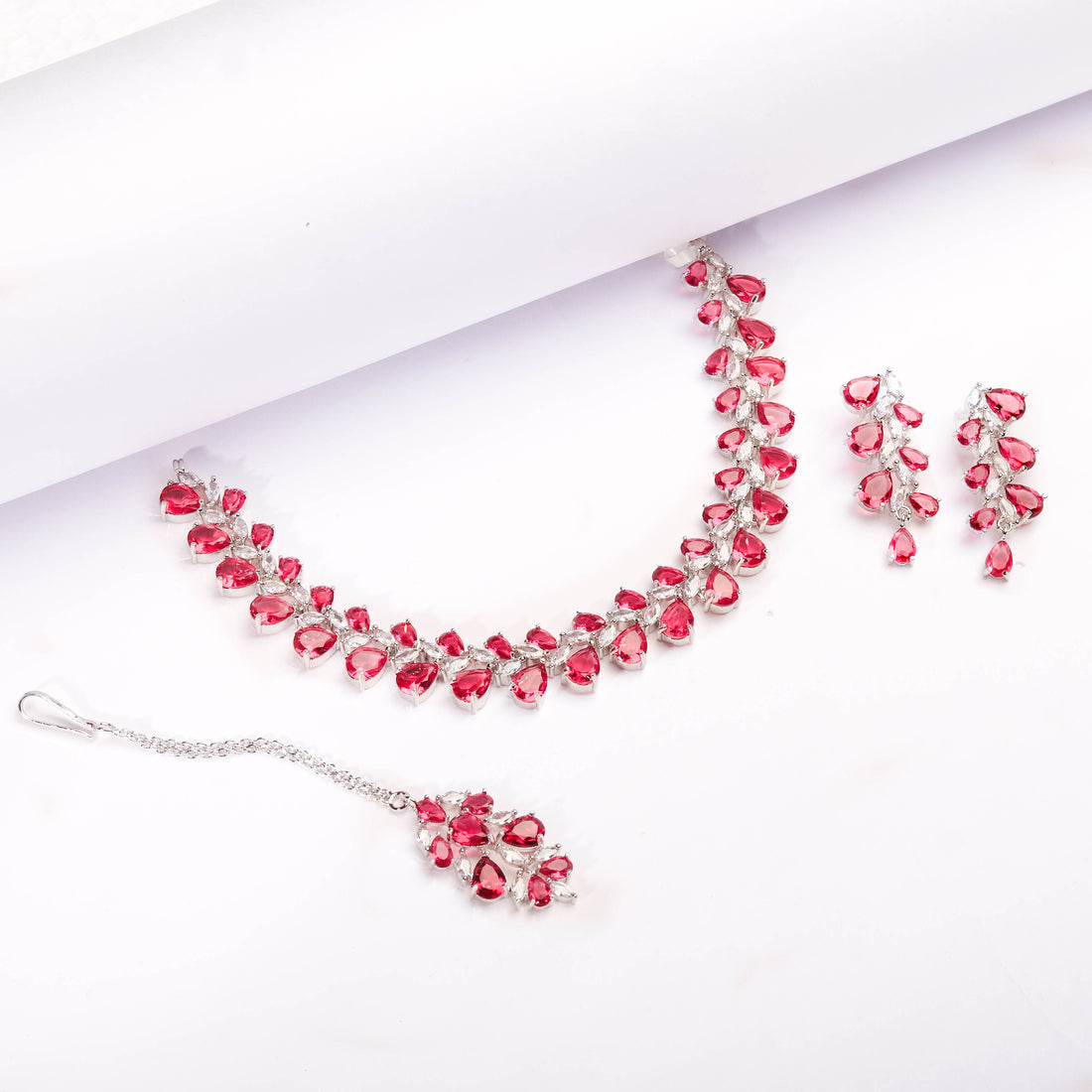 Rhodium Plated Luxurious Ruby Red Color Necklace Set With Earrings And Maang Tikka