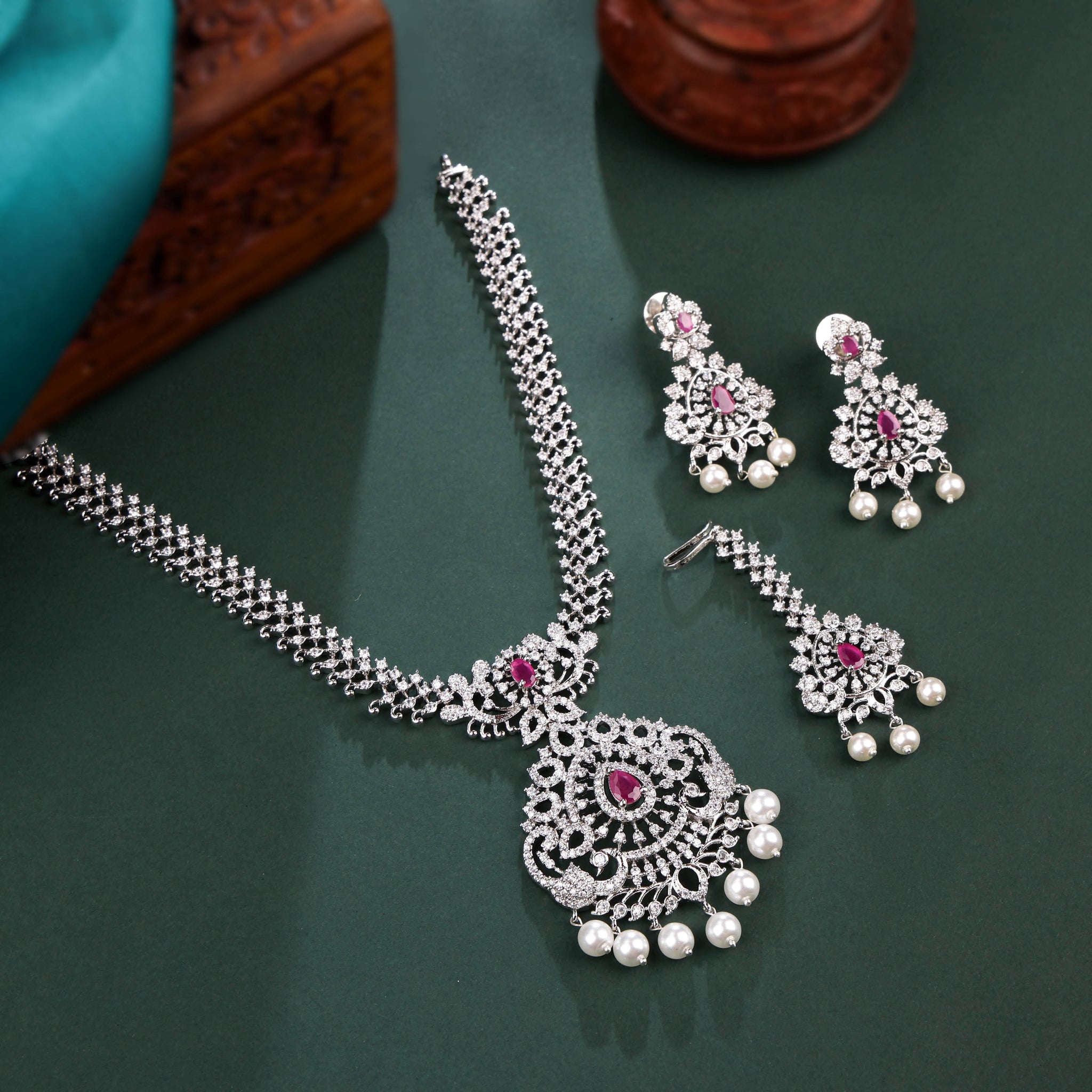 Rhodium Plated Necklace Set With Pink Color Stones And Pearl Drops Style Work And Maang tikka