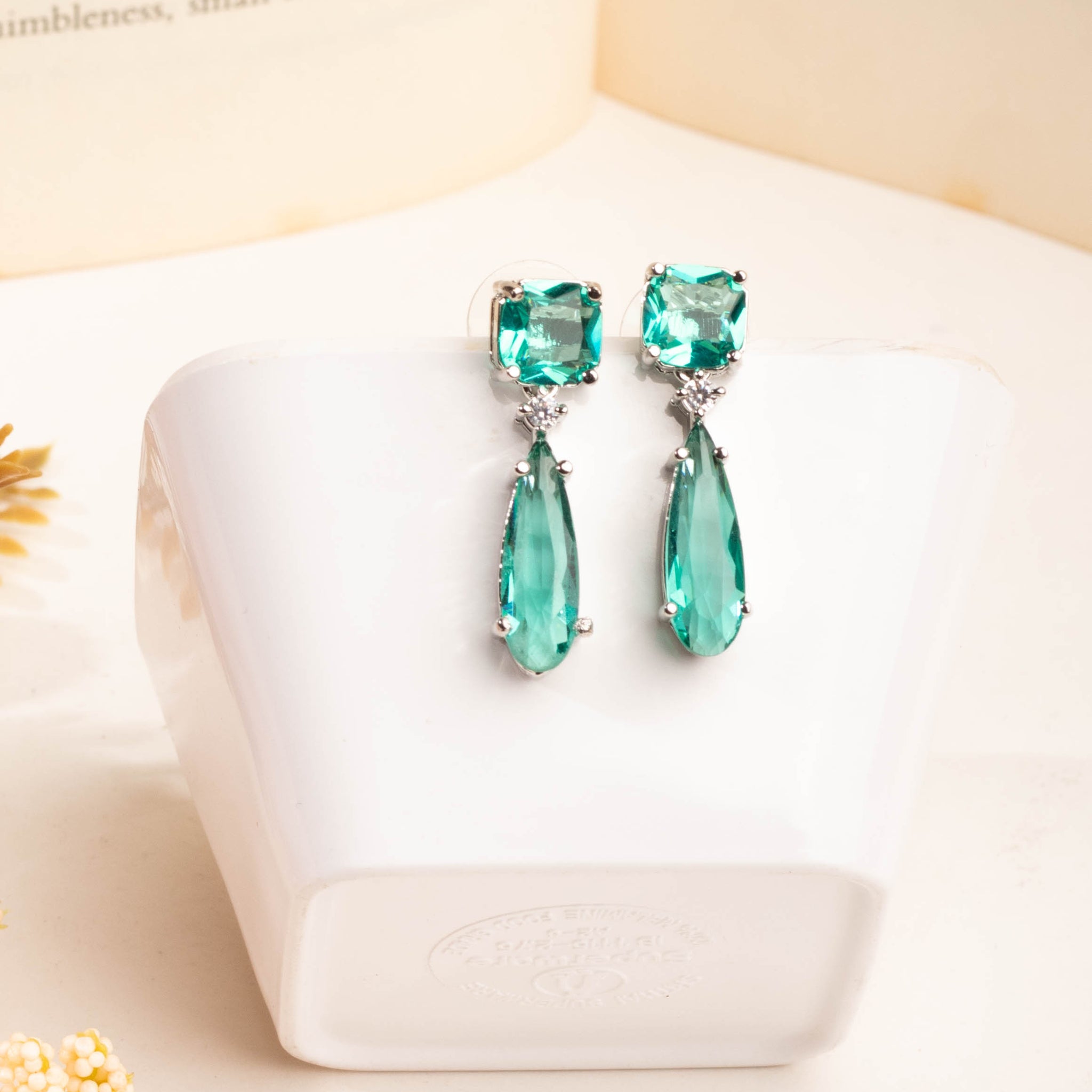 Magnificent Rhodium Plated Teal Green Sapphire Studded CZ Drop Earrings For Women