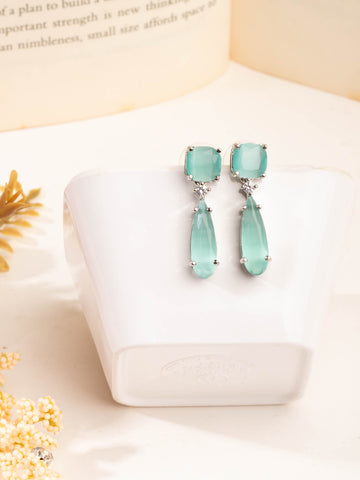 Magnificent Rhodium Plated Aquamarine Studded CZ Drop Earrings For Women